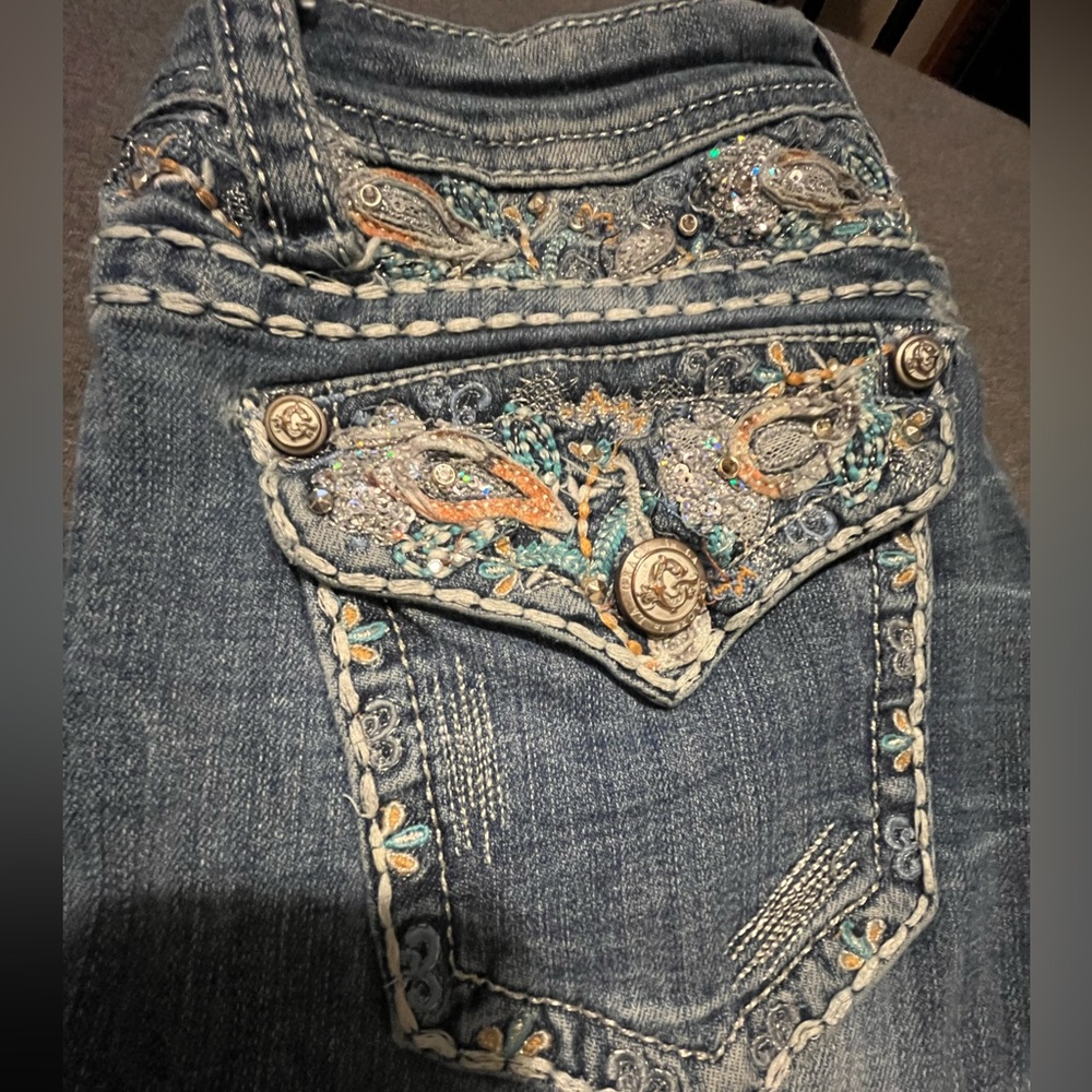 rhinestone bootcut light blue jeans